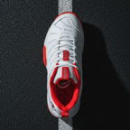 Teuton ST2 All Court shoe Light Grey - three-quarter on-court lifestyle shot